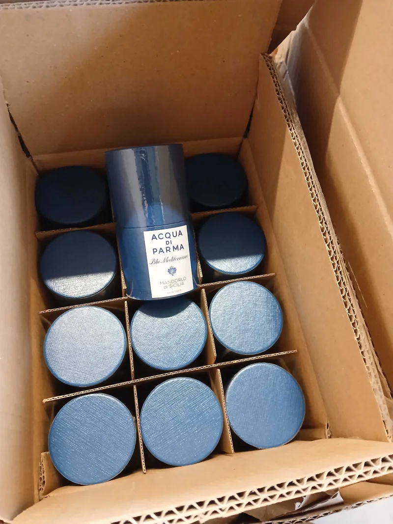 KRINOVA warehouse operations: fragrance units in divided cartons